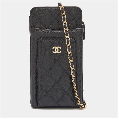 chanel caviar phone holder.